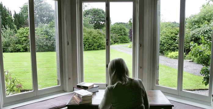 Tyrone-Guthrie-Fellow-Working-in-Window-CROPPED
